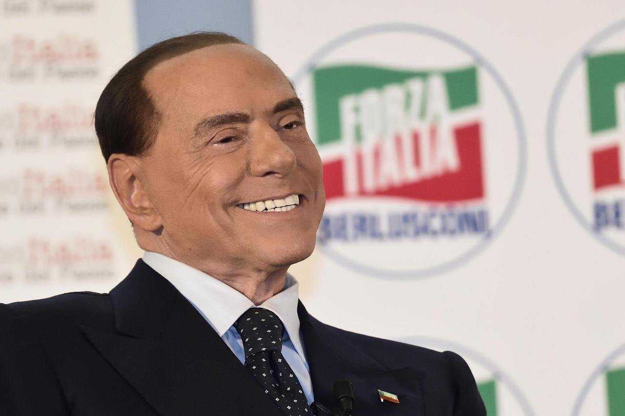Берлускони из-за океана